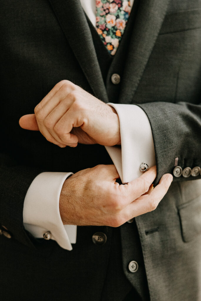 Philadelphia Groom getting into his suit